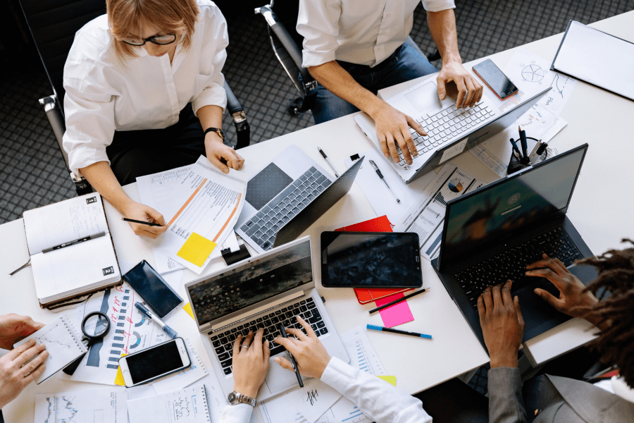Diverse team working at table